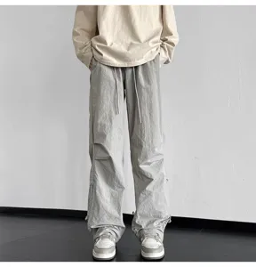 Nuevo pantalon paracaidas gris hombre y mujer holgado cordon ajustable piernas anchas streetwear chic