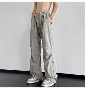 Pantalon paracaidas streetwear gris hombre ancho casual cordón piernas anchas style