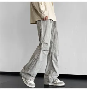 Pantalón cargo paracaídas casual holgado de hombre con cordones y bolsillos gris streetwear