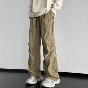 Pantalón de paracaídas holgado casual para hombre y mujer, pantalón ancho con cordón.