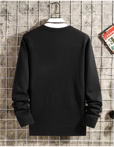 Detailed view of casual black crewneck knitted sweater, solid color basic menswear top.