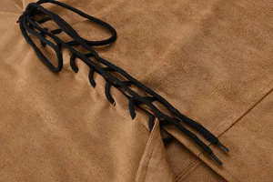 Close-up detail of men suede lace-up sleeveless vest jacket, textured fabric autumn fashion.