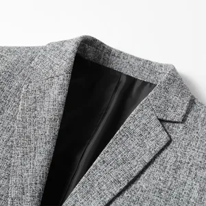 Men's grey casual blazer jacket close-up, stylish single suit top for spring men fashion.