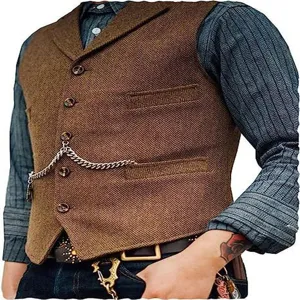 Detailed view of men's brown herringbone tweed waistcoat featuring classic lapel and chain.