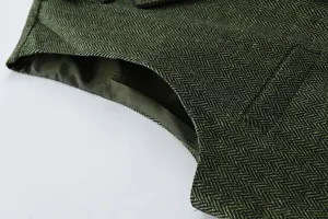 Herringbone vest detail shot, classic green fabric texture and smooth lining craftsmanship.