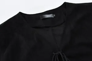 Men black suede vest collar detail, sleeveless casual waistcoat design close-up view.