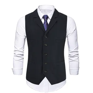 Close-up detail of men's slim fit business suit vest with classic herringbone pattern.