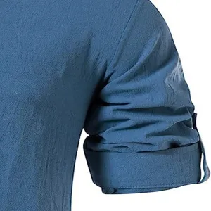 Men linen long sleeve shirt fabric detail view, casual blue beach shirt close up view.