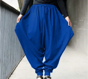 Detailed view of men's loose royal blue harem pants featuring a stylish drop-crotch design.