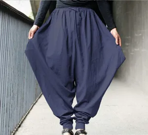 Detail view of men casual harem pants loose drop crotch trousers in dark blue color fabric