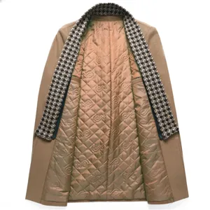Men's thickened wool trench coat interior detail, houndstooth lapel design, warm quilted lining.