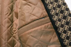 Close-up detail of men's winter wool coat interior, quilted lining and pocket design.
