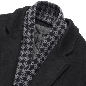 Men's thickened wool overcoat detail view, premium fabric and quilted lining texture.