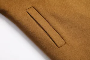 Men's wool blend coat pocket detail, premium camel winter overcoat close-up view.