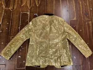 Men's gold sequin blazer jacket back view, shiny disco party suit outerwear detail.