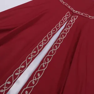 Close-up detail of medieval vintage dress silver embroidery trim and elegant neckline.