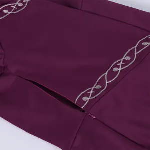 Detailed view of medieval Renaissance vintage dress with elegant silver embroidery.