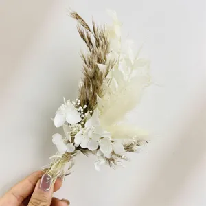 Mini dried flower bouquet closeup, preserved plants arrangement for home decor and gifts.
