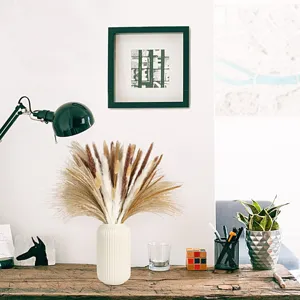 Dried pampas grass and rabbit tail flower bouquet, natural dried plant home decor detail.
