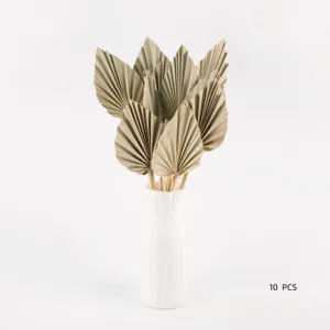 Mini dried palm leaves for home wedding decor, natural sun palm fan leaves bouquet detail.