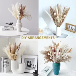 Detailed view of DIY dried pampas grass and rabbit tail flower arrangements in elegant white vases.
