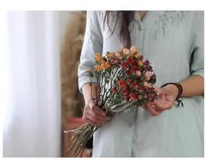 Dried rose bouquet detail, vintage air-dried real flowers for home decoration and photography.