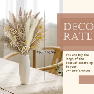 Natural dried pampas grass bouquet with white ceramic vase for home decor and floral arrangement.