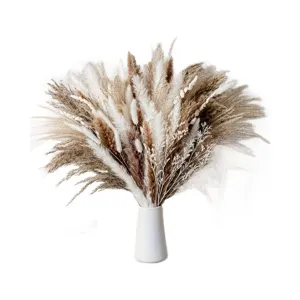 Όμορφο φυσικό αποξηραμένο μπουκέτο pampas grass με λευκό βάζο για διακόσμηση γάμου.
