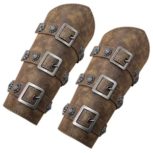 Medieval vintage leather bracers detail view, metal buckles and rivets, knight costume props.