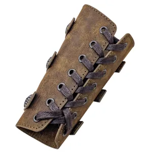 Detailed view of the medieval retro knight leather bracer with lacing and metal studs.