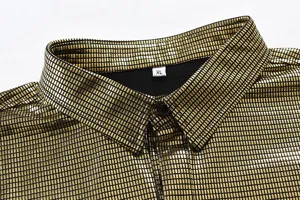Close-up detail of mens long sleeve shiny gold shirt collar, premium metallic fabric texture.