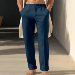 Closeup detail of casual deep blue straight-leg linen trousers featuring side pockets.