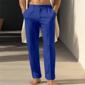 Detail view of men's casual royal blue straight leg linen trousers with slant pockets.