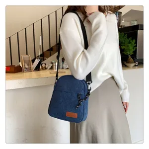 Stylish corduroy crossbody bag for women, trendy solid color casual shoulder bag for daily commute.
