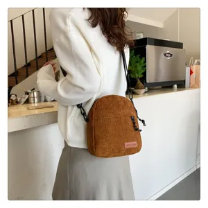 Corduroy crossbody bag for women, casual daily shoulder bag with adjustable strap and zip pocket.