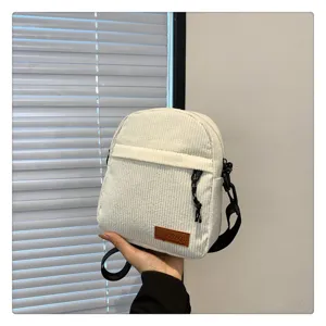 White corduroy crossbody bag, trendy shoulder bag for women daily casual commute stylishly.