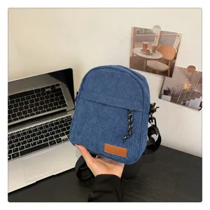Corduroy crossbody bag for women, casual stylish small shoulder bag with zipper pocket and strap.