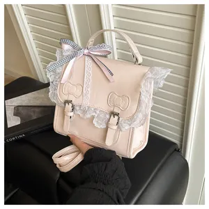 Pink PU leather small backpack purse with sweet lace trim and cute bows for daily commute.