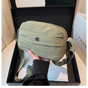 Chic lightweight green nylon crossbody bag, casual multi-layer shoulder bag for women daily.