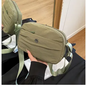Green nylon crossbody bag casual multi-layer shoulder bag lightweight daily travel purse.