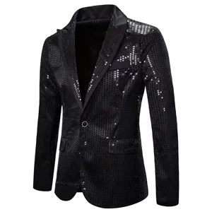 Close up detail of black sequin men blazer showing glittering fabric texture and satin lapel.