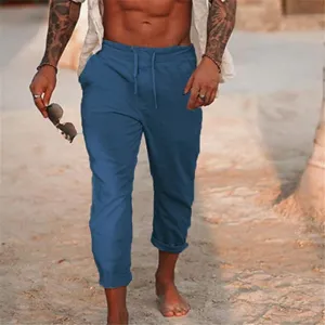 Pantaloni da spiaggia uomo lino dettaglio vista, comodi estivi larghi con coulisse blu casual.