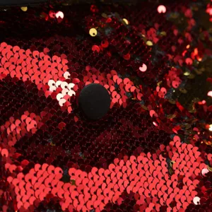 Détail de gros plan du tissu de veste de smoking de fête pour hommes à sequins.