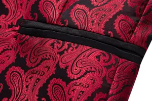 Detail shot of men red and black paisley jacquard blazer pocket, elegant fashion formal suit top.