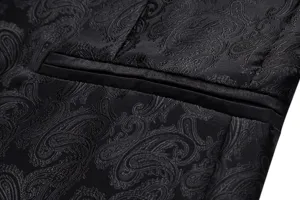Men's black paisley jacquard suit jacket pocket detail view showing exquisite craftsmanship.