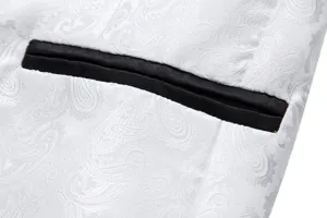 Men's white paisley jacquard suit jacket detail view showing black contrast welt pocket.