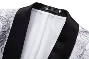 Men's formal suit jacket detail close-up showcasing black lapel and grey paisley pattern.