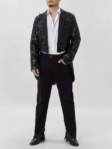 Detailed view of men's black sequin tailcoat stage performance jacket with white shirt.
