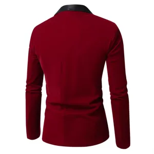 Back view detail of men burgundy velvet suit jacket featuring black contrast lapel.