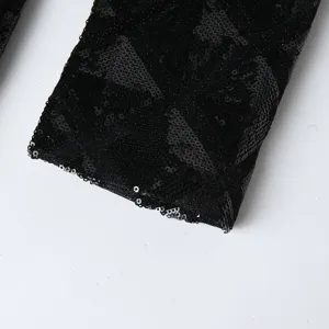 Detailed view of black 3D square sequin men's blazer sleeve, fashion casual style.